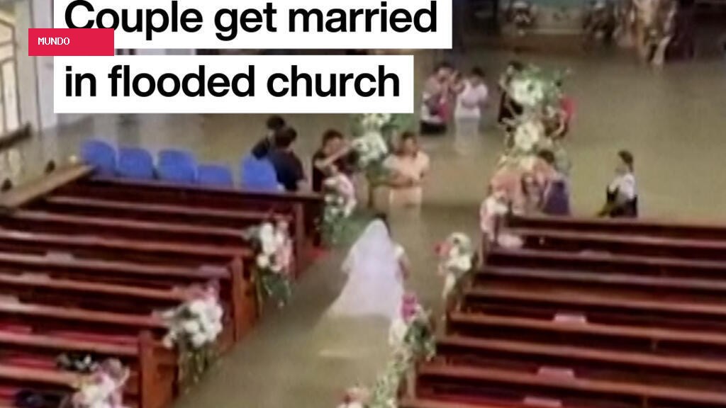 Philippine couple married in hip-deep floodwaters